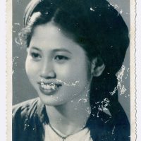 Portrait of a young girl in traditional fashion from North Vietnam 